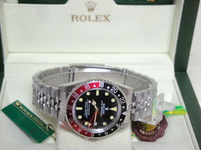 Rolex replica GMT master II vintage plexy 1675 rosso nero jubilèè orologio replica imitazione - immagine 6