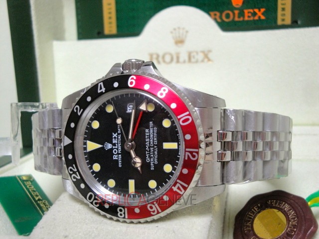 Rolex replica GMT master II vintage plexy 1675 rosso nero jubilèè orologio replica imitazione - immagine 8
