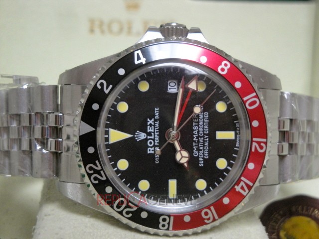 Rolex replica GMT master II vintage plexy 1675 rosso nero jubilèè orologio replica imitazione - immagine 9