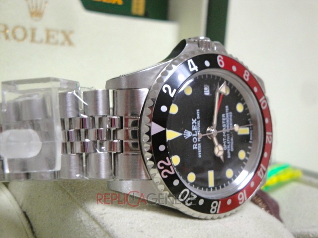 Rolex replica GMT master II vintage plexy 1675 rosso nero jubilèè orologio replica imitazione - immagine 10