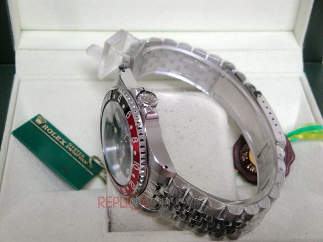 Rolex replica GMT master II vintage plexy 1675 rosso nero jubilèè orologio replica imitazione - immagine 11