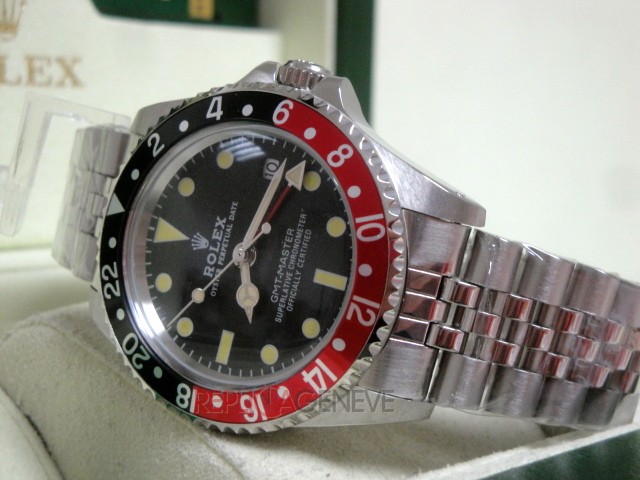Rolex replica GMT master II vintage plexy 1675 rosso nero jubilèè orologio replica imitazione - immagine 12