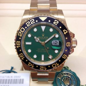Rolex replica GMT Master II yellow gold 116718LN green dial